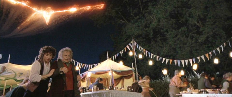 Image shows Frodo and Bilbo with firework