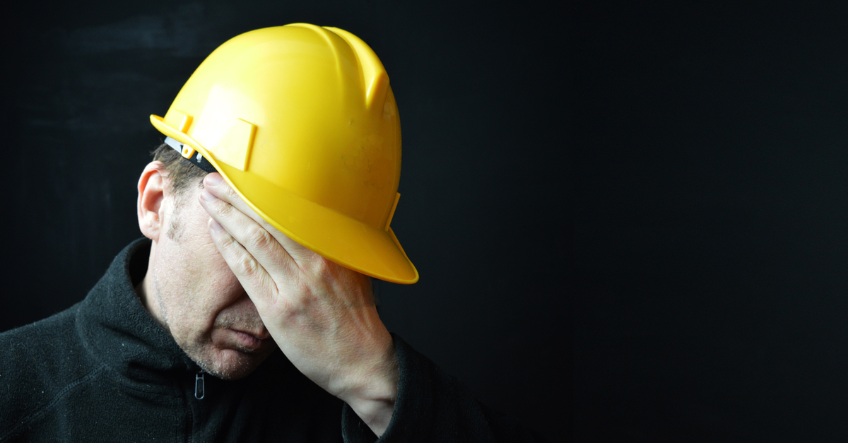 picture shows a construction worker looking sad to illustrate a blog by Essential Site Skills on mental health concerns in the construction industry 